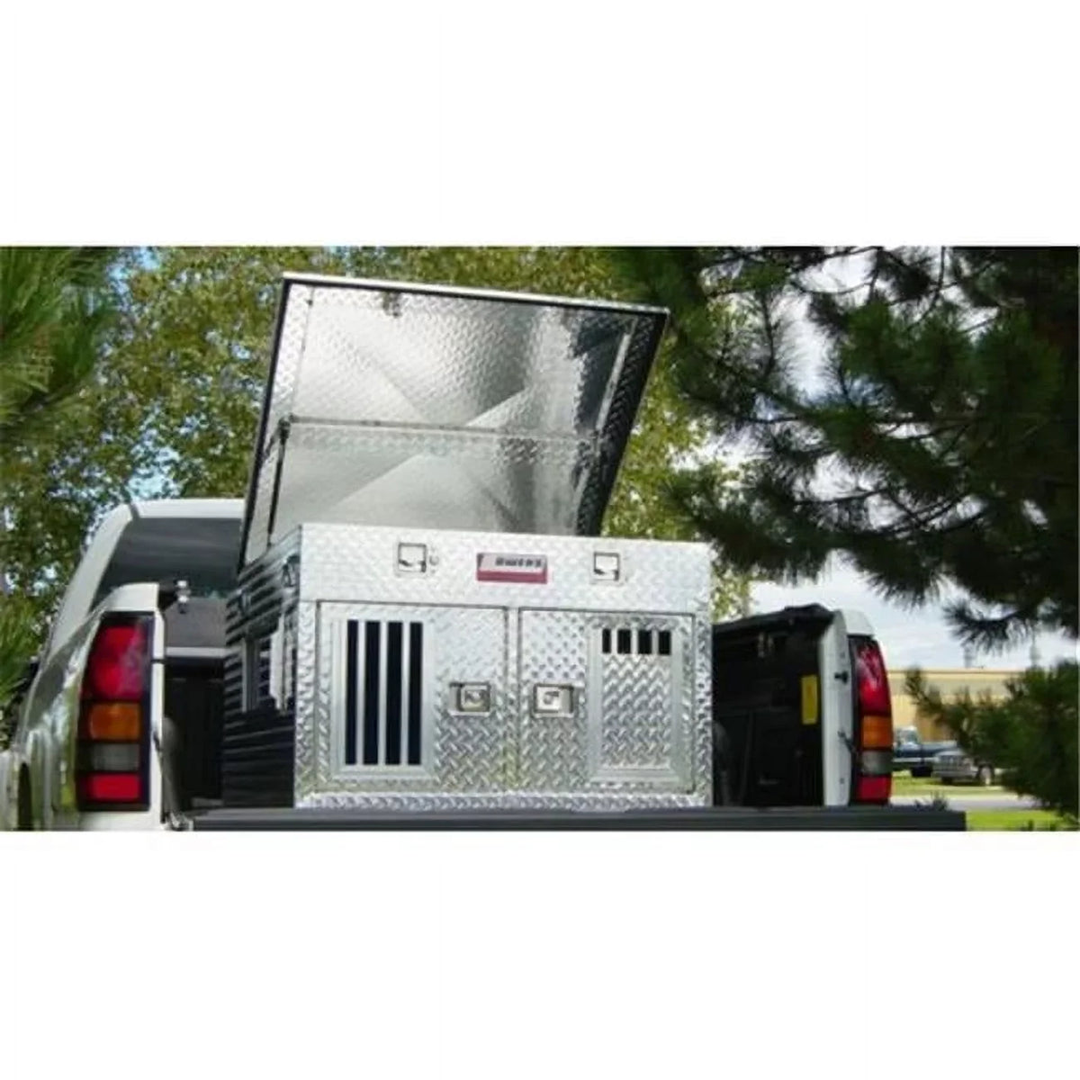 Hunter series dog box with top storage. Owens products, Inc